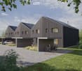 Modern two-story house with dark wooden exterior, multiple windows, and a covered entrance area. The house features a garage, a paved driveway, and a grassy lawn with trees and bicycles near the entrance.