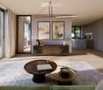 Modern living room with a grey sofa, dark wooden coffee table, side table, and a grey cabinet. The room features large windows with curtains, a sleek pendant light, and a view of the kitchen area.