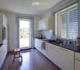 {"type": "Kitchen", "objects": ["cabinet", "sink", "faucet", "oven", "stool", "cup", "bottle", "cup", "cup", "cup", "cup", "cup", "cup", "cup", "cup", "cup", "cup", "cup", "cup", "cup", "cup", "cup", "cup", "cup", "cup", "cup", "cup", "cup", "cup", "cup",