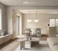 white walls, hardwood floors, a glass window, a dining table and chairs, a living room with a couch, and a white rug