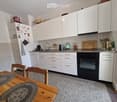 {"type": "Kitchen", "objects": ["refrigerator", "oven", "sink", "faucet", "cutting board", "oven mitt", "table", "chair", "cup", "fridge magnet", "oven", "oven mitt", "oven", "oven", "oven", "oven", "oven", "oven", "oven", "oven", "oven", "oven", "oven",