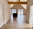 high ceiling, wooden floor, open plan kitchen, glass doors
