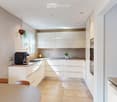 {"type": "Kitchen", "objects": ["table", "chair", "coffee maker", "faucet", "sink", "radiator", "radiator", "radiator", "radiator", "radiator", "radiator", "radiator", "radiator", "radiator", "radiator", "radiator", "radiator", "radiator", "radiator", "ra
