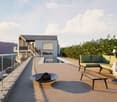 A modern outdoor terrace with a swimming pool, seating area, and scenic mountain view.