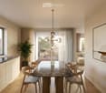 Modern dining area with a marble dining table, six chairs, a chandelier, a potted plant, a sofa, and a large picture frame on the wall. The room has large windows and a view of a balcony with outdoor furniture.