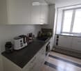 {"type": "Kitchen", "objects": ["oven", "fridge", "sink", "faucet", "cupboard", "bottle", "cup", "fridge", "oven", "bottle", "cupboard", "cupboard", "cupboard", "cupboard", "cupboard", "cupboard", "cupboard", "cupboard", "cupboard", "cupboard", "cupboard"