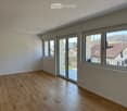 empty room, wooden floor, white walls, sliding glass doors, balcony, large windows, view of the outside