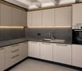 Modern kitchen with light-colored cabinets, dark countertops, and built-in appliances including a sink and oven.