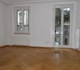 empty room, white walls, wooden floor, double doors with balcony, windows