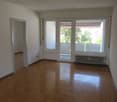 empty room, hardwood floor, sliding doors, balcony, sliding door shade, white walls
