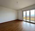 empty room, sliding glass doors, balcony, wooden floor, white walls