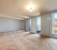 empty room, wooden parquet floor, white walls, glass doors, balcony with railing, ceiling light