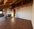 Wooden ceiling, tiled floor, fireplace, wooden beams