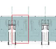 Floor plan with multiple rooms, central lift, and staircases