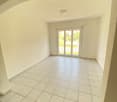 white tiles, ceiling light, glass door to balcony, empty room