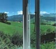 sliding glass doors, balcony, tiled floor, view of green field and mountains