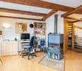 office, chair, desk, monitor, book shelves, fireplace