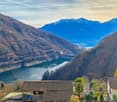 Mountains, lake, houses, trees, dam, crane