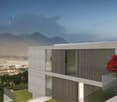Modern concrete and glass house with balconies, situated on a hillside overlooking a city and mountains in the distance. The house has a minimalist, geometric design with clean lines and large windows. A red tree is visible in the foreground, adding a pop