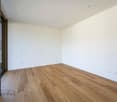 empty room, wooden floor, white walls, sliding glass door