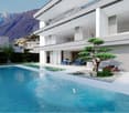 Modern two-story house with large windows, a swimming pool, and a balcony or terrace overlooking the mountains. The house has a minimalist design with a Japanese-inspired garden featuring a bonsai tree and other landscaping elements.