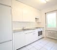 modern kitchen with white cabinets, stainless steel sink, dishwasher, electric oven, refrigerator, tiled floor