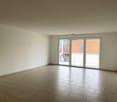 empty room, sliding glass doors to balcony, tiled floor