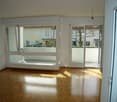 empty room, sliding glass doors, balcony, white walls, wooden floor