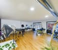 wood floor, tables, chairs, photo studio equipment, plants