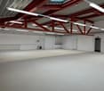 Empty room with white ceiling and floor, red metal beams, white walls, gray carpet, a few white radiators, and overhead lighting.