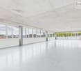 Empty room, high ceiling, large windows, tiled floor, modern design, wide-angle view