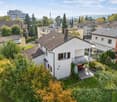 White house, brown roof, terrace, balcony, fenced garden, outdoor dining area
