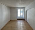 empty room, wooden floor, white walls, white ceiling, window