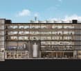 Multi-story office building, glass windows, balconies, interior equipment