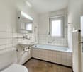 white tiles, bathtub, sink, toilet, shower, window