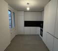 kitchen area, cabinets, built-in oven, countertop, window