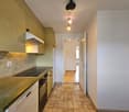 kitchen with stove, oven, extractor hood, fridge, dishwasher, countertop, tiled flooring, cabinets
