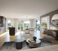 Open plan living room and dining area with wooden flooring, modern round table, elegant chairs, and sliding glass doors leading to a garden