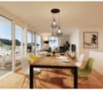 Dining room: wooden dining table, chairs, chandelier, panoramic glass windows, kitchen, living area