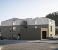 Modern residential building with multiple levels, grey exterior, numerous windows, driveway for cars, entrance with fencing, nearby parked vehicles