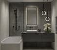 modern bathroom, floating vanity, large mirror, undermount sink, shower with black shower head, bathtub, tiled wall, grey flooring, two towels on towel rack, flower vase on counter