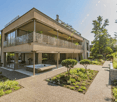 Modern house, 2 stories, large windows, balcony, outdoor jacuzzi, garden