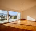 sliding doors, balcony, wooden floor, view of the sea and mountains