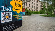 Signboard advertising private office production storage, 5th floor, in front of a large building