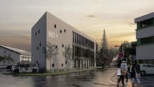 Office building, gray exterior, text 'BIEF 9', several windows, car parked in front, trees, sidewalk, people walking, another building in the background.