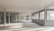 Empty office space, concrete walls, white pillars, large windows with blinds, high ceiling