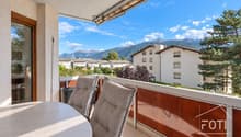 Balcon avec vue sur les Alpes