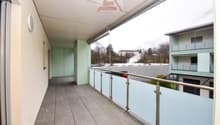 balcony with glass railing, view of mountains, tiled floor, walls, ceiling