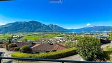 Mountains, valley, houses, greenery, road, water