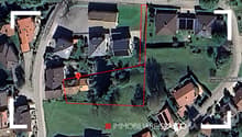 Plot with two houses on it